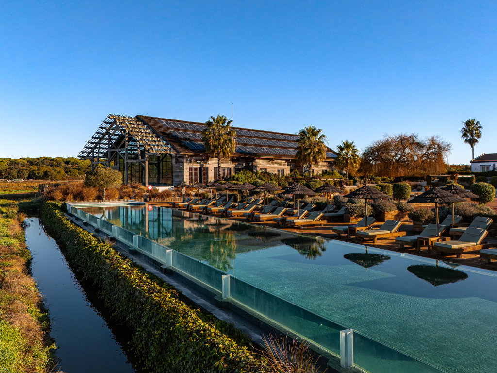 A design-led boutique hotel with a reflecting pool by the Comporta rice fields
