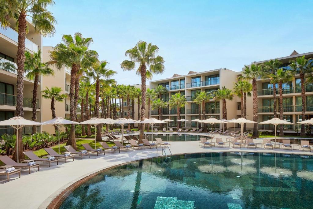 A five-star resort with palm-lined pools in the Algarve